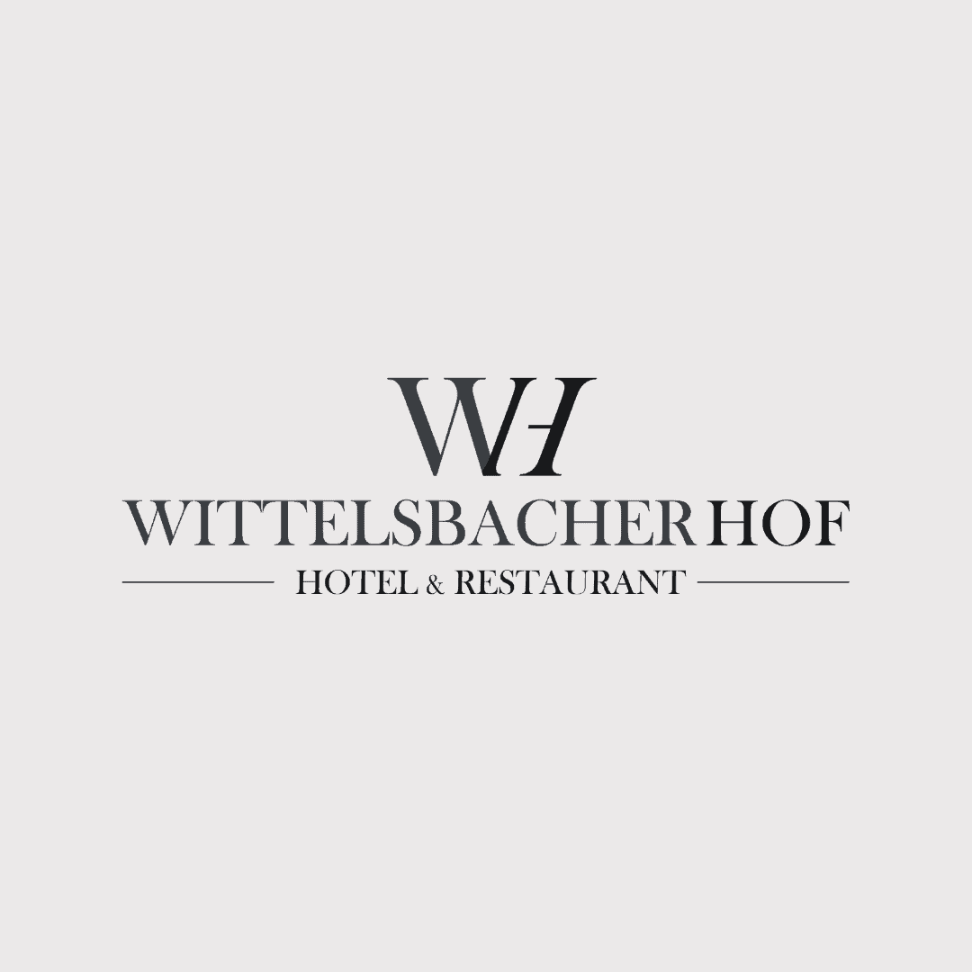 Logo des Wittelsbacher Hof Hotels.